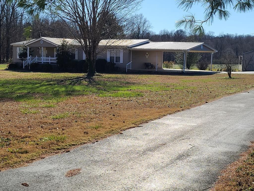 2.53 Acres, 6439 Cedar Grove Road, Big Sandy, TN 28221 Land and Farm