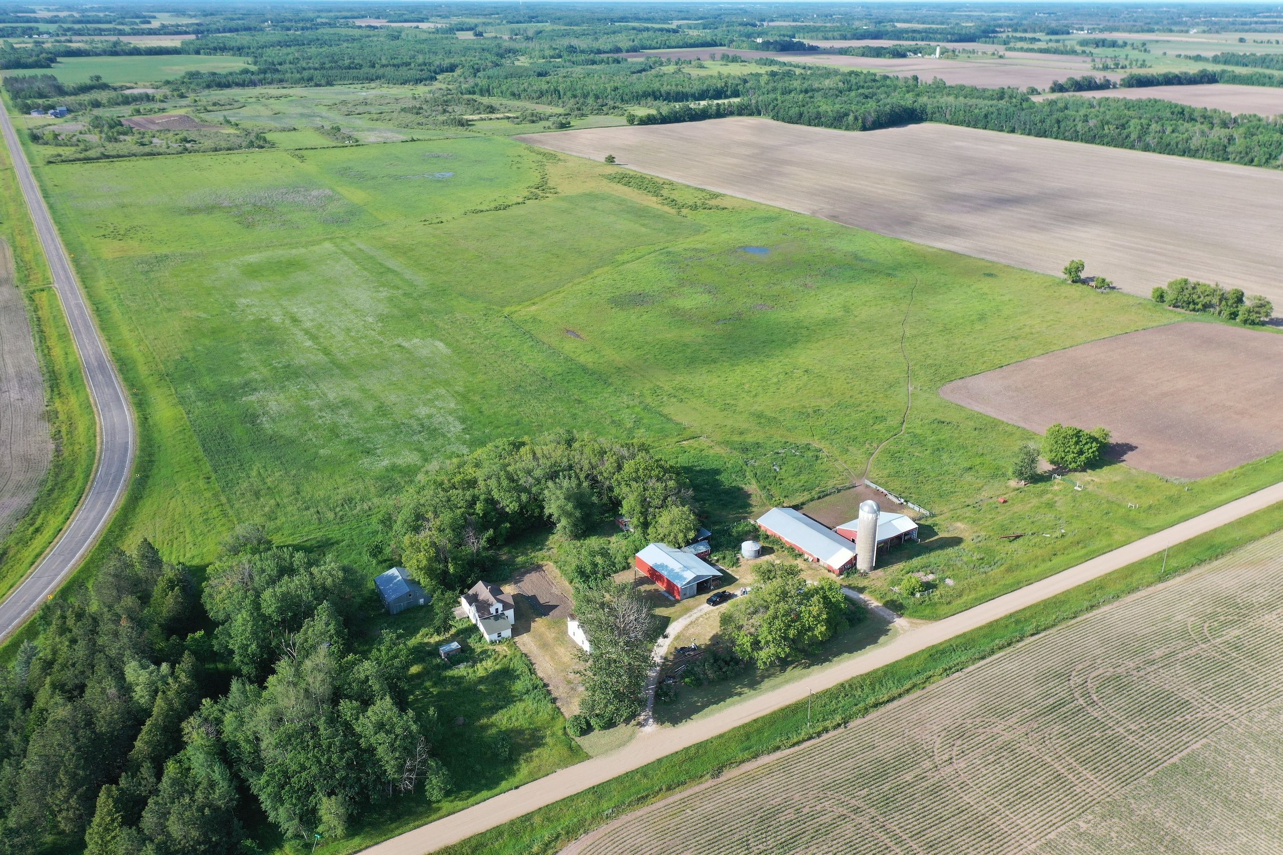 201 West Main Street, Parkers Prairie, MN 56361 Land and Farm